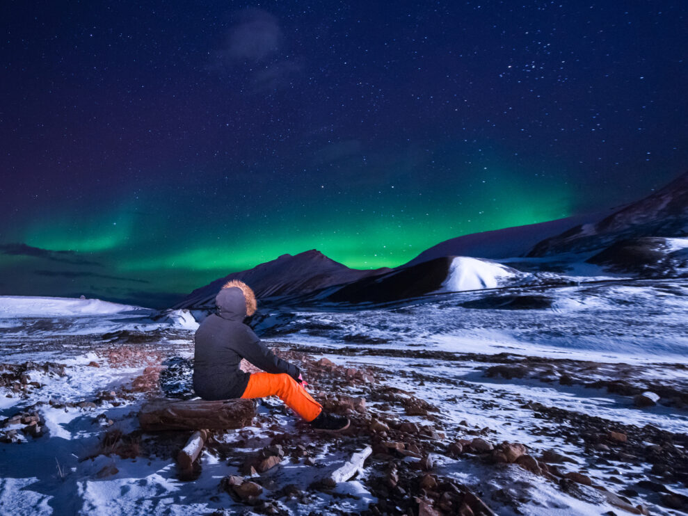 arctic Northern lights aurora borealis sky star in Norway Svalbard in Longyearbyen city  mountains
