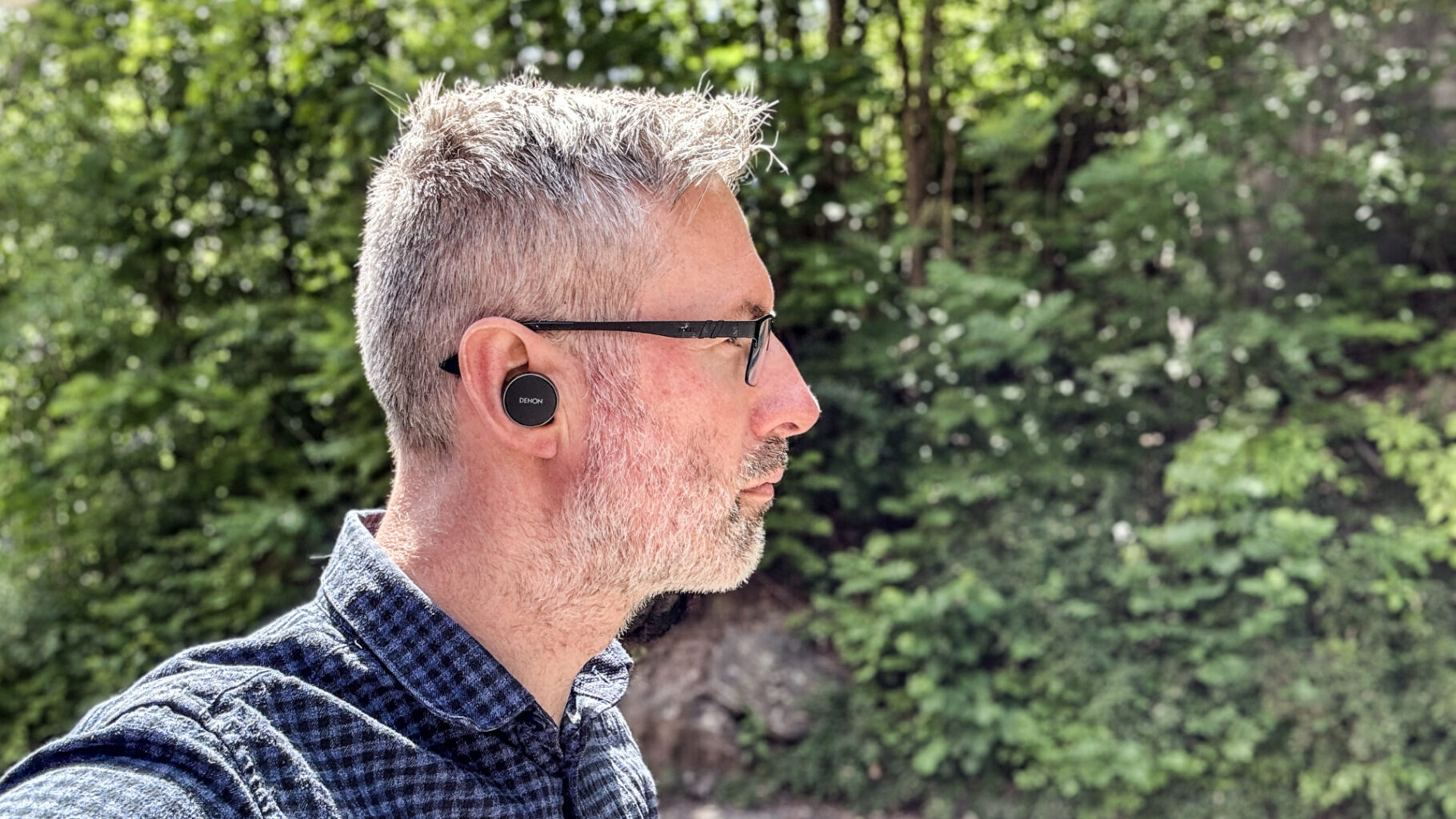 Denon PerL Pro 1 a man wearing glasses and a wireless earbuds Denon PerL Pro - GeirNordby