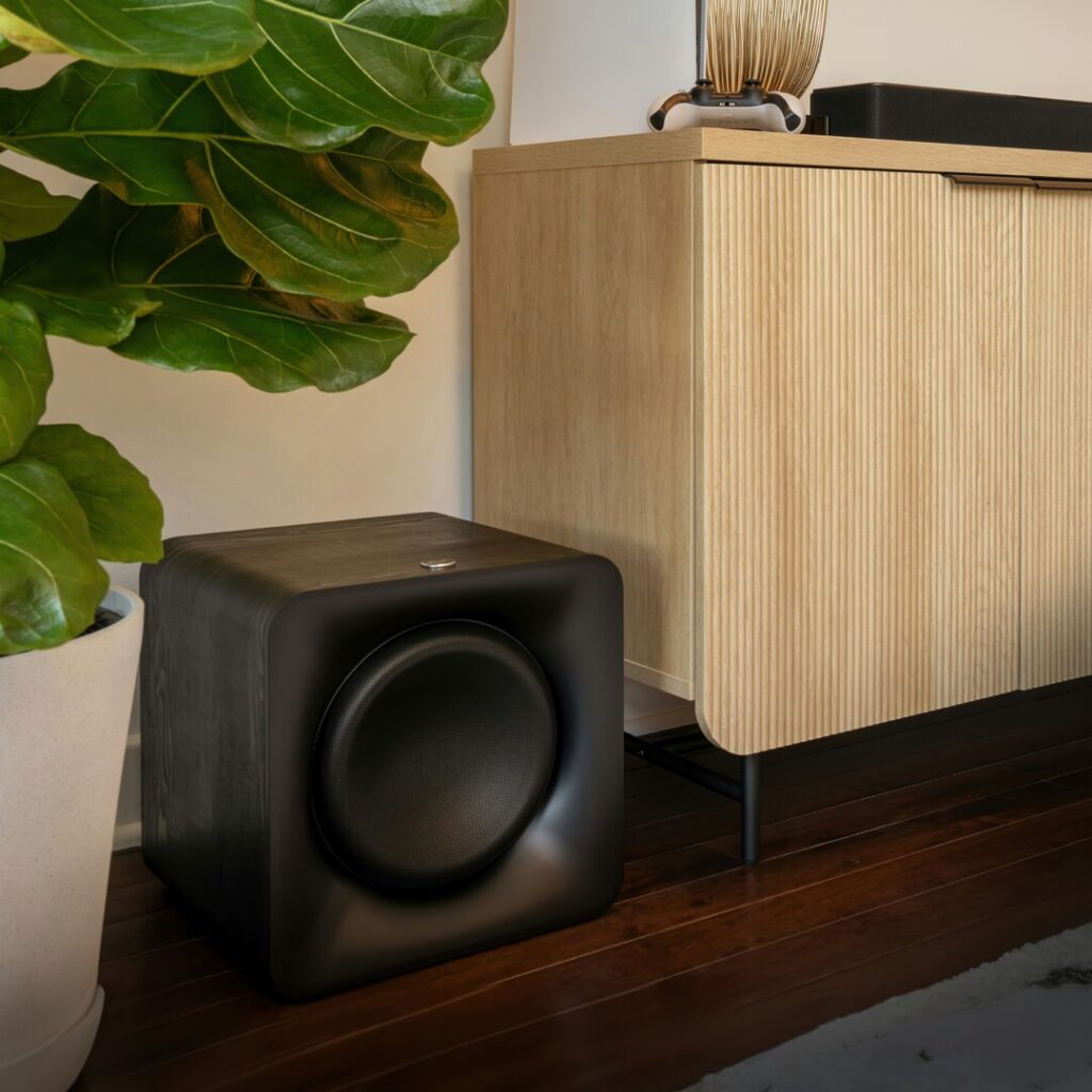 Klipsch Flexus Core 200 + Sub 100 2 Klipsch Flexus SUB 100 beside fiddle leaf fig 2000x2000 logo v02 copy resized